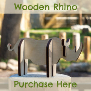 purchase a wooden rhino to commemorate Masamba's arrival